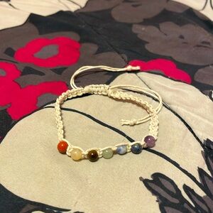 Chakra white string bracelet.